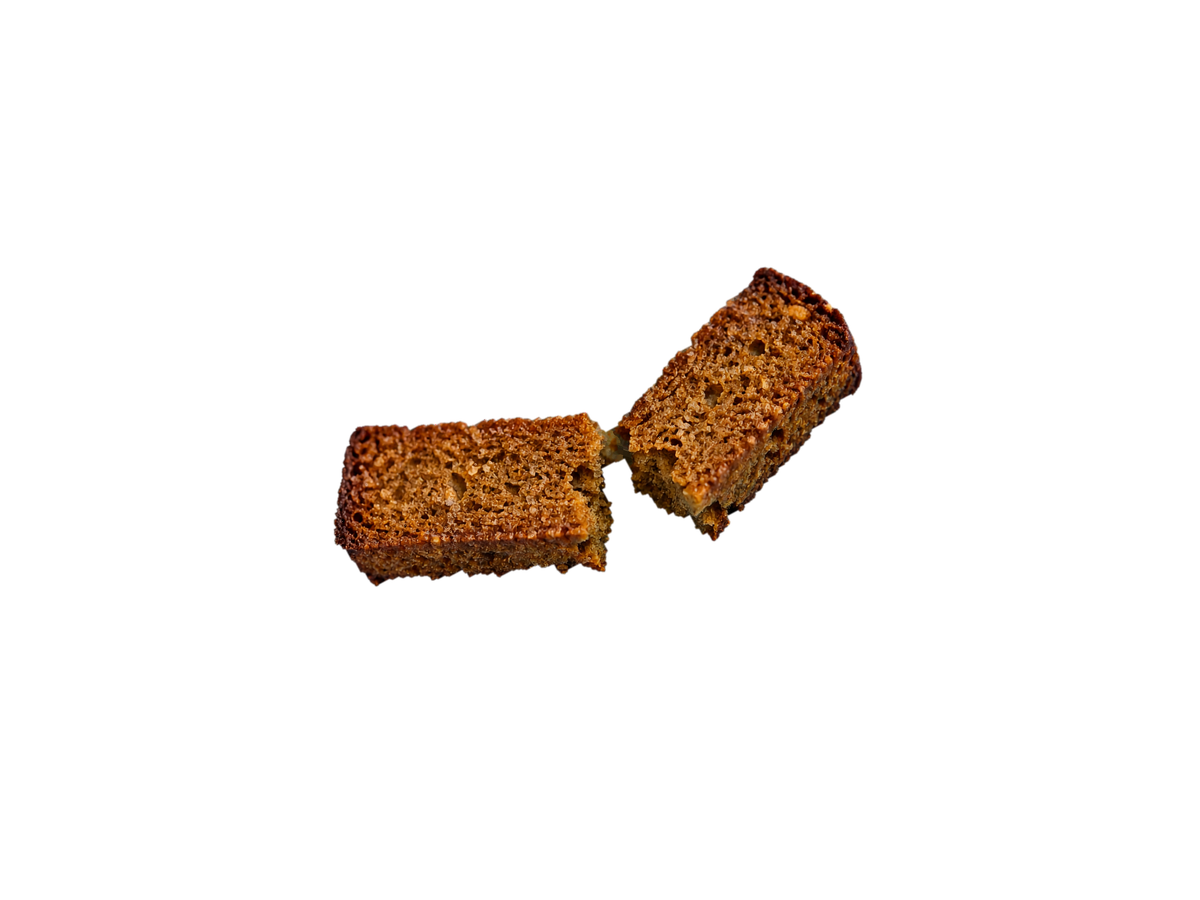 Falling broken rusk with crumbs